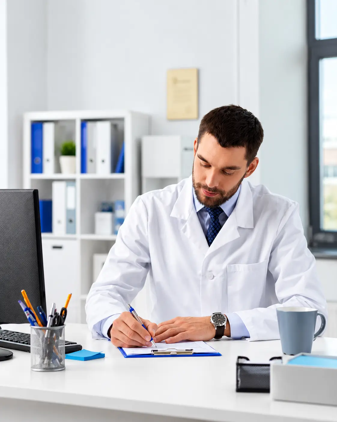 A patient at the Four Star Medical Center reception desk